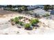 Gravel and flagstone fire pit in the backyard, perfect for entertaining in this outdoor living space at 480 China St, Pahrump, NV 89048