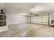 This is a spacious garage with high ceilings and storage on one side at 480 China St, Pahrump, NV 89048