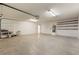 This is a spacious garage with high ceilings and built-in storage shelves at 480 China St, Pahrump, NV 89048