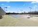 Well-maintained tennis court with lighting for evening play at 4909 Ocean Shores Way, Las Vegas, NV 89130