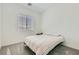 Neutral-toned bedroom with natural light and modern window treatments at 498 Pebble Run Ave, Henderson, NV 89011