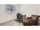 Home office space featuring comfortable seating and a functional workspace at 498 Pebble Run Ave, Henderson, NV 89011