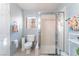 Bathroom featuring glass enclosed shower, toilet, and towel rack at 5350 Sharon Marie Ct, Las Vegas, NV 89118