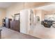 Hallway from carpeted bedroom leading to tiled living area and more at 5350 Sharon Marie Ct, Las Vegas, NV 89118