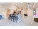 Open-concept kitchen featuring bar stool seating and access to dining and living areas at 5350 Sharon Marie Ct, Las Vegas, NV 89118