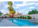 Relaxing pool and spa, complete with desert landscaping, create a serene outdoor retreat at 5350 Sharon Marie Ct, Las Vegas, NV 89118