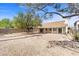 The spacious backyard provides room for outdoor activities and entertaining with a covered patio at 538 Ancient Mayan Dr, Henderson, NV 89015