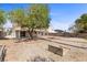 Expansive backyard with mature trees, covered patio, and plenty of space for outdoor activities at 538 Ancient Mayan Dr, Henderson, NV 89015