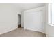 Neutral bedroom with a closet, carpet, and freshly painted walls at 538 Ancient Mayan Dr, Henderson, NV 89015