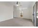 Spacious neutral bedroom featuring closet, adjoining bathroom, and backyard access at 538 Ancient Mayan Dr, Henderson, NV 89015