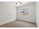 Clean, neutral bedroom with a ceiling fan, window, new paint, and carpet at 538 Ancient Mayan Dr, Henderson, NV 89015