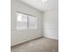 Bright, neutral bedroom with window and fresh, clean walls and carpet at 538 Ancient Mayan Dr, Henderson, NV 89015