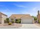 Attractive single-story home with a well-maintained front yard and a spacious driveway leading to a two-car garage at 538 Ancient Mayan Dr, Henderson, NV 89015