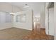 Inviting living space with tile flooring, neutral carpet, and an open layout that provides a seamless flow between spaces at 538 Ancient Mayan Dr, Henderson, NV 89015