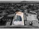 This is an aerial view of the home with a large, fenced lot and a detached garage, ready for your vision at 5580 Waltham Ln, Las Vegas, NV 89122