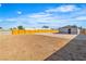 Large lot with a wooden fence around it, showcasing room for development and outdoor living at 5580 Waltham Ln, Las Vegas, NV 89122