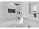 Modern bathroom featuring sleek fixtures, new tile, and ample light at 5580 Waltham Ln, Las Vegas, NV 89122