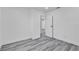 Spacious bedroom featuring modern flooring, closet, and neutral walls at 5580 Waltham Ln, Las Vegas, NV 89122