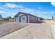 Charming home featuring a secure fence, desert landscaping, and unique window accents at 5580 Waltham Ln, Las Vegas, NV 89122