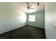 A well-lit bedroom features neutral walls, a ceiling fan, and ample natural light at 602 Painted Cloud Pl, Las Vegas, NV 89144