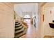 Grand entryway featuring a staircase, high ceilings, and tile flooring at 602 Painted Cloud Pl, Las Vegas, NV 89144