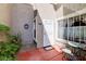 Cozy front porch with outdoor seating, decorative accents, and a welcoming entrance at 602 Painted Cloud Pl, Las Vegas, NV 89144