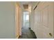 Bright hallway with multiple doors and access to other rooms in the home at 602 Painted Cloud Pl, Las Vegas, NV 89144
