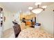 Eat in kitchen featuring a breakfast bar, stainless steel appliances and modern lighting at 602 Painted Cloud Pl, Las Vegas, NV 89144