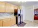 Kitchen featuring stainless steel appliances, wood cabinets, and ample counter space at 602 Painted Cloud Pl, Las Vegas, NV 89144