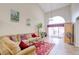 Spacious living room with high ceilings, ample natural light, and stylish decor at 602 Painted Cloud Pl, Las Vegas, NV 89144