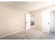 Neutral bedroom with carpet, a closet, and a hallway view at 6260 Castle Kennedy St, Henderson, NV 89011
