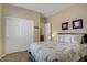 Comfortable bedroom featuring a double bed and closet at 6440 Bristlebird St, North Las Vegas, NV 89084