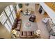 Open-concept living room featuring modern decor and comfortable seating area at 6440 Bristlebird St, North Las Vegas, NV 89084