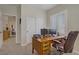 Home office featuring a desk, office chair and storage space at 6440 Bristlebird St, North Las Vegas, NV 89084