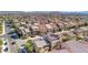 Real estate image of a suburban neighborhood showcasing well maintained homes with red tile roofs at 6714 Flamenco Ct, Las Vegas, NV 89139