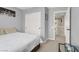 Comfortable bedroom features a closet and an open doorway to a landing at 6869 Desert Thrasher Dr, North Las Vegas, NV 89084