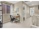 Cozy landing area featuring a desk space and views to the rest of the home at 6869 Desert Thrasher Dr, North Las Vegas, NV 89084