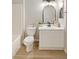 This bathroom features a sleek vanity, modern fixtures, framed mirror, and a tub and shower combination at 7155 S Durango Dr # 309, Las Vegas, NV 89113