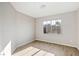 Bright and airy bedroom space with natural light, neutral colors, and wood flooring, offering a blank canvas at 7155 S Durango Dr # 309, Las Vegas, NV 89113