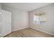 This bedroom features a window, light walls, and a modern closet at 7155 S Durango Dr # 309, Las Vegas, NV 89113