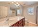 Bathroom featuring a single sink vanity and a shower with a curtain at 75 Archer Glen Ave, Henderson, NV 89002
