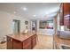 Kitchen with granite countertops and open view into the dining room at 75 Archer Glen Ave, Henderson, NV 89002