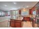 Open layout kitchen with ample counter space and outdoor view at 75 Archer Glen Ave, Henderson, NV 89002