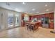 Open kitchen boasts an island, stainless steel appliances, and beautiful countertops at 75 Archer Glen Ave, Henderson, NV 89002