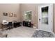 Bright and airy entryway with decorative rug, desk, and modern accents at 7630 Canyon Diablo Rd, Las Vegas, NV 89179
