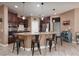 Kitchen featuring a large center island with pendant lighting and barstool seating at 7630 Canyon Diablo Rd, Las Vegas, NV 89179