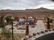 Beautiful community park area with colorful art installations and desert landscape views in the background at 7630 Canyon Diablo Rd, Las Vegas, NV 89179