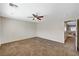 Spacious bonus room featuring neutral walls, carpet, and ceiling fan at 7637 Good Fortune Ct, Las Vegas, NV 89139