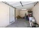 Attached garage with a side door, and room for storage and parking at 7645 Interlace St, Las Vegas, NV 89149