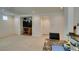 Open living room with new carpet, neutral paint, and recessed lighting at 7645 Interlace St, Las Vegas, NV 89149